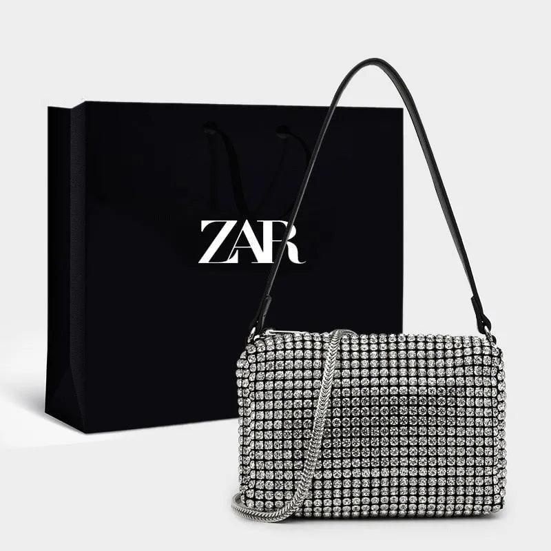 Bolsa Compacta Cravejada - Luxury
